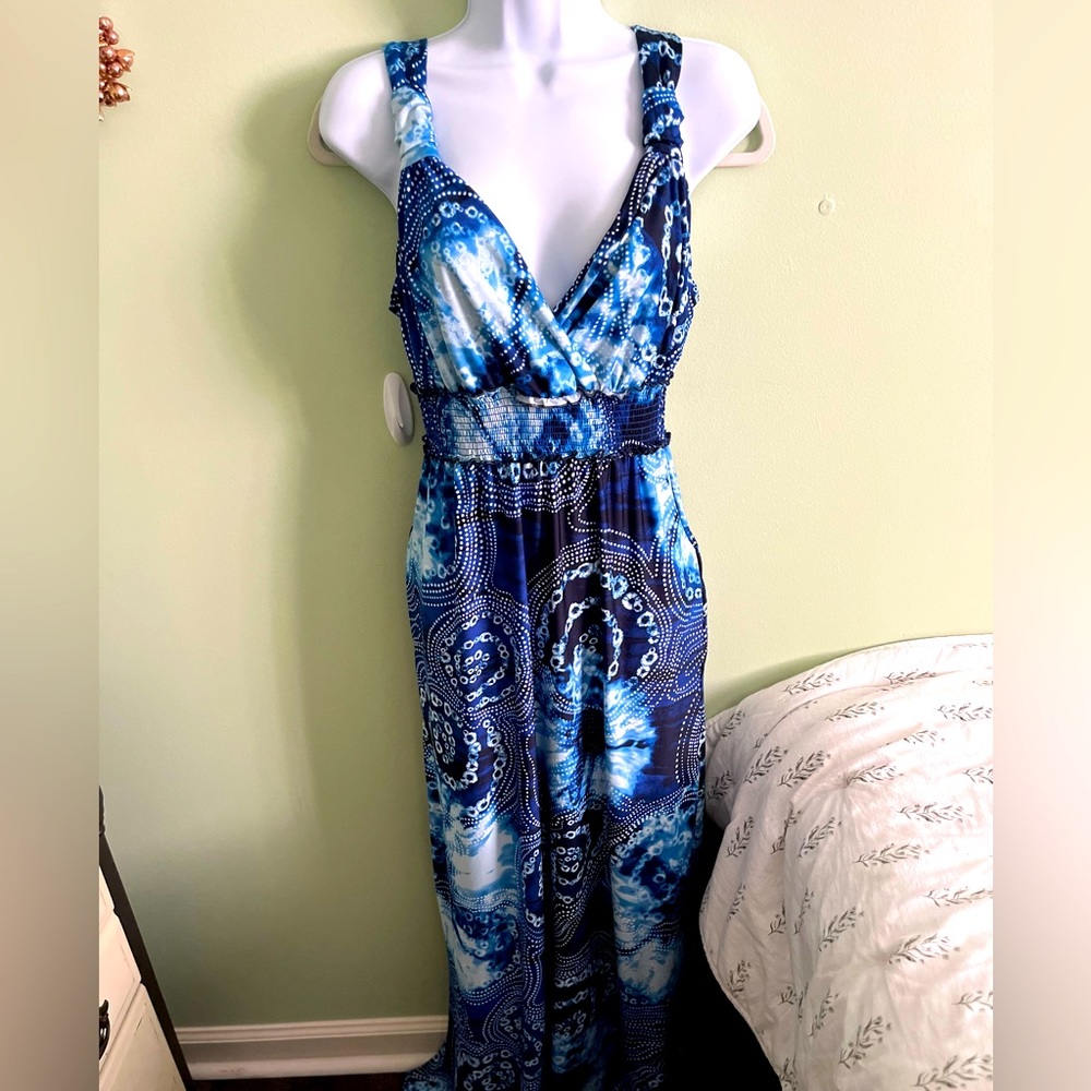 Love this dress! Have kept hoping I could fit in it again! Beautiful color/fit